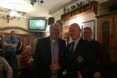 Chairman-Gary-Tobin-presenting-Eddie-Collins-with-St-Michaels-Blazer-after-2014-PIFC-1st-Rd-Win